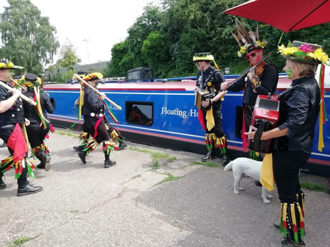 King size bed on a narrow canal boat